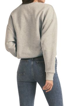 Here's the slightly slouchy sweatshirt that's the favorite to win at weekends. 27" length (size Medium) Crewneck Long sleeves 75% cotton, 25% polyester Machine wash, tumble dry Imported Comfy French Terry Tops For Fall, Trendy French Terry Tops With Ribbed Cuffs, Trendy Soft-washed French Terry Tops, Oversized Heather Grey Crew Neck Sweater, Casual Slouchy Sweater With Ribbed Cuffs, Trendy Ribbed Neckline Sweatshirt For Loungewear, Slouchy Casual Sweater For Loungewear, Everyday Fall Tops With Ribbed Cuffs, Fall Tops With Ribbed Cuffs For Everyday