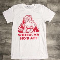 Gildan “Where My Ho’s At” Santa Graphic Tee New Without Tags Size Small 100% Cotton 243 244 White Casual Christmas Shirt, Holiday White T-shirt With Graphic Print, Red Crew Neck Top With Funny Print, White Christmas Graphic Tee Tops, White Christmas Graphic Tee, White Graphic Print T-shirt For The Holiday, White Graphic Print T-shirt For Holidays, White Graphic Print Shirt For Holiday, Casual White Top For Christmas