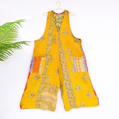 Plus Size Summer Overalls, Lose Fit Kantha Jumpsuits, Cotton Patchwork Dungarees, Upcycled Hippie Clothing,Boho Aesthetic Cotton Rompers This Kantha Bohemian Loose Jumpsuit is an essential piece of upcycled fashion. Featuring a boho style, its cotton fabric is sure to make a statement. Its wide leg and hippie dungarees design creates maximum comfort with a bohemian touch Handmade Material: Cotton Two Side Pockets Size: One Size (PLUS) Length: Approx. 55 inches Bust: Approx. up to 50 inches Hips: Approx. up to 68 inches Inseam: Approx. up to 20 inches EACH PANT WILL BE DIFFERENT IN COLOR THAN IN THE PICTURE AS THEY ARE MADE OF DIFFERENT PATCHES ** ETHICALLY SOURCED ** FAIRTRADE ** SUSTAINABLE FASHION Bohemian Jumpsuits And Rompers With Pockets For Festival, Bohemian Patchwork Jumpsuits And Rompers For Summer, Bohemian Jumpsuits And Rompers With Pockets For Beach, Patchwork Dungarees, Summer Overalls, Harem Pants Fashion, Cotton Dungaree, Hippie Clothing, Boho Yoga