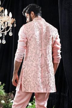 Blush bundi with floral embroidery. Paired with kurta and pant.
Component: 3
Pattern: Embroidered
Type Of Work: Floral
Neckline: Band
Sleeve Type: Kurta: Long
Fabric: Satin Organza, Textured And Glace Cotton
Color: Pink
Other Details: 
Floral motifs
Front buttons
Occasion: Destination Wedding - Aza Fashions Mahima Mahajan, Ridhi Mehra, Kurta Set For Men, Tarun Tahiliani, Vogue India, Color Blush, Kurta With Pants, Kurta Set, Floral Motifs