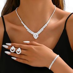 Gender:Women's; What's in the box:1 Necklace,1 Bracelet,Earrings; Quantity:Three-piece Suit; Theme:Drop,Love,Precious; Style:Stylish,Elegant; Jewelry Type:Bridal Jewelry Sets; Occasion:Party Evening,Gift,Wedding; Material:Imitation Diamond; Length of Earrings:2.2; Length of Necklace:3417; Design:Classic; Features:Lovely; Front page:WE; Shipping Weight:0.02; Listing Date:08/13/2024 Copper Wedding Theme, Designer Wedding Jewelry, Bridal Dangle Earrings, Elegant Wedding Jewelry, Traditional Bridal Jewelry, Wedding Jewellery Designs, Unique Wedding Jewelry, Bridal Statement Earrings, Wedding Jewelry For Bride