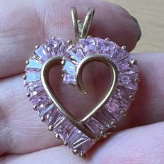 Beautiful Vintage Pendant In Solid 10k Yellow Gold With Unusual Baguette Cut Pink Cz Cubic Zirconia Stones. I Purchased This Pendant In The Late 1990’s When I Started Collecting Pink Ice ( Cz) Jewelry . I Actually Never Wore It, Just Admired As Part If My Collection And The Pendant Was Stored In The Safe For Years , I Decided To Sell Some Pieces To Let Someone Wear And Enjoy It! Pink Gold Cubic Zirconia Heart Cut Jewelry, Pink Gold Heart Cut Cubic Zirconia Jewelry, Pink Gold Heart-shaped Cubic Zirconia Jewelry, Pink Heart Cut Diamond Jewelry, Pink Open Heart Jewelry For Wedding, Heart-shaped Pink Jewelry With Diamond Accents, Fine Jewelry Heart Cut Pink Jewelry, Pink Heart Cut Jewelry With Diamond Accents, Pink Heart-shaped Jewelry With Diamond Accents