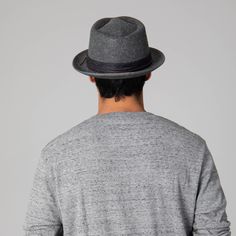 This premium Faux Felt Pork Pie Fedora offers superior style with a 1.75" brim, grosgrain printed band, and knotted faux leather cording. Its timeless silhouette lends a sophisticated look that never goes out of fashion. Features: Color: BlackMaterials: 100% PolyesterSize: 59cmBrim Size: 1.75" Fitted Leather Fedora For Fall, Elegant Leather Fedora, Adjustable Leather Fedora For Formal Occasions, Formal Adjustable Leather Fedora, Adjustable Fur Felt Fedora For Spring, Spring Adjustable Fur Felt Fedora, Spring Leather Brimmed Fedora, Spring Leather Fedora With Short Brim, Fitted Leather Hat Band For Fall