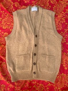 The Moors Shetland Wool Sweater Vest-Grey or Tan Two choices grey sweater vest or tan button up sweater vest with pockets -PRICE IS FOR 1 SWEATER The Moors Lord Jeff brand 100% Shetland wool Size Medium (B27) Solid Color Fall Vest With Pockets, Casual Sweater Vest With Pockets For Fall, Beige Fall Sweater Vest With Pockets, Cotton Sweater Vest With Pockets For Winter, Fall Sweater Vest With Pockets For Layering, Beige Sweater Vest With Pockets For Fall, Fall Layering Sweater Vest With Pockets, Beige Vest With Pockets For Fall, Fall Sleeveless Sweater Vest With Pockets