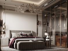 a bedroom with a large bed and mirrored closets in the wall, along with a chandelier hanging from the ceiling