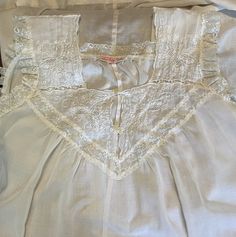 A beautiful vintage pure white cotton and lace sleeveless nightgown by Bert Yelin designed for Iris Cottagecore. Beautiful lace in a triangular shape on the front with 2 pearl luster round buttons. Measures approximately 52"L x 18" armpit to armpit. Size S. In excellent preowned condition. The photos are an integral part of the description. Please view them carefully and message any questions. I am here to help. THANKS 😊 Note: The shipping cost for this particular item is calculated by Etsy's C Sleeveless Nightgown, Thanks Note, Long Nightgown, Womens Lingerie, Round Button, Pure White, Women Lingerie, Night Gown, White Cotton