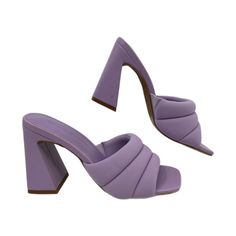 Step Into A World Of Style And Comfort With The Open Edit Purple Puffy Heeled Slide Sandal. With An Ultra-High Block Heel That Screams Confidence And A Puffy, Plush Design That Whispers Comfort, These Sandals Are The Perfect Blend Of Bold And Beautiful. Ideal For Any Occasion And Versatile Enough For Any Outfit, These Sandals Are Destined To Become Your Go-To Footwear. And With Their Vibrant Purple Color, They’re Sure To Turn Heads Wherever You Go! Features: - Made In China - Crafted From High-Q Eva Sandals With Padded Block Heel, Chic Eva Sandals With Padded Heel, Trendy Closed Toe Sandals With Sculpted Heel, Trendy Synthetic Mules With Padded Heel, Trendy Medium Width Mules For Party, Eva Heels With Padded Heel And Round Toe, Purple Open Toe Heels With Sculpted Heel, Trendy Sandals With Padded Heel In Eva, Trendy Sandals With Padded Heel And Eva Material