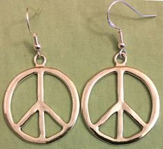 Metal Symbolic Hypoallergenic Earrings, Silver Hypoallergenic Symbolic Earrings, Silver Symbolic Hypoallergenic Earrings, Symbolic Hypoallergenic Metal Jewelry, Bronze Hypoallergenic Metal Jewelry, Hypoallergenic Bronze Metal Jewelry, Vintage Jewelry With Peace Sign As Gift, Vintage Peace Sign Jewelry Gift, Vintage Jewelry With Peace Sign For Gift