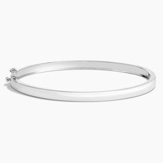 Engravable Bangle Bracelet (4mm) - 14K White Gold. Chic and effortless, this 4mm engravable bangle bracelet is the perfect addition to any wrist stack and easily worn alone as a trendy statement piece. Classic Engraved Sterling Silver Bracelet For Everyday Use, Classic Gold Engraved Bangle Bracelet, Elegant White Gold Bangle For Everyday, Elegant Everyday White Gold Bangle, Classic Engraved Bangle Bracelets, Classic Engraved Sterling Silver Bangle Bracelet, Stackable White Gold Bangle For Everyday, Everyday Stackable White Gold Bangle, Classic Sterling Silver Bangle Bracelet For Formal Occasions