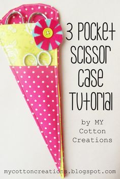 the three pocket scissors case is made out of fabric and has pink polka dots on it