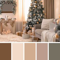 a living room with a christmas tree and other decorations in shades of brown, beige and white