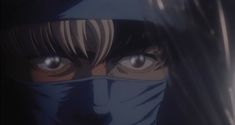 an anime character wearing a face mask and looking at the camera with big blue eyes