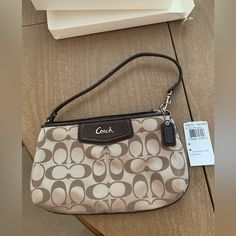 Coach Clutch Bag With Handle And 8 Card Holders And One Large Slip Pocket Inside Nwt, Still In Original Box. Coach Beige Bag With Zipper Pouch, Classic Coach Bag With Zipper Pouch, Coach Bags With Zipper Pouch For Formal Occasions, Chic Coach Bag With Zipper Pouch, Coach Clutch, Maroon Leather, Black Wristlet, Bags Coach, Coach Wallet