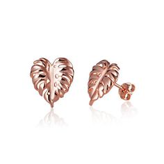 In this photo there is a pair of 14k rose gold monstera stud earrings. Monstera Earrings, Leaf Patterns, Rose Gold Earrings Studs, Rose Gold Studs, Leaf Motif, Family Tradition, Swiss Cheese, Small Earrings Studs, Monstera Leaf