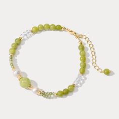 Indulge in the refreshing nature of summer with our Green Grape Beaded Bracelet. The vibrant green grapes, paired with shimmering pearls and cubic zirconia, create a playful and graceful accessory that will light up people's eyes. Embrace the fabulous and exquisite feel of this bracelet and add a touch of coolness to your wardrobe.  DETAILS Plating: 18K Gold Materials:   18K Gold on Brass,   Pearl, Cubic Zirconia, Gemstones Measurements: Length: 5.91 "(15cm)   + Extender: 1.97"(5cm) Weight: 5.8 Green Grape, Everyday Wear Jewelry, Fruit Necklace, Astrology Jewelry, Astrology Necklace, Moon And Star Ring, Trending Bracelets, Moon And Star Earrings, Nature Earrings