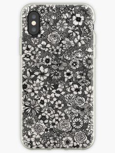 an iphone case with black and white flowers on the front, in full blooming pattern