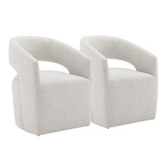 two white chairs sitting next to each other