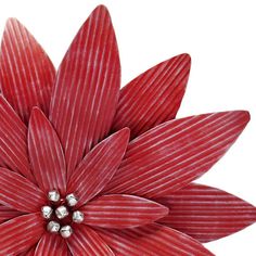 a red flower with silver balls in the center is shown on a white background for use as an ornament