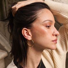 We combined a classic, pared-down aesthetic with 14k solid gold to create our timeless Tube Hoop Earrings. Made with forever in mind, these ultra-lightweight hoops are forged from solid gold (not plated or filled), which means they’ll never tarnish. Wear them all day, every day — they suit any situation. Classic Small Hoop Earrings In 14k Gold Filled, Classic 14k Gold Filled Hoop Earrings For Everyday Luxury, 14k Gold Filled Earrings With Polished Finish For Everyday, Timeless Small Hoop Earrings For Everyday Elegance, Minimalist Round Huggie Earrings, Minimalist Everyday Elegance Huggie Earrings, Modern Small Hoop Earrings For Everyday Elegance, Modern Small Hoop Jewelry For Everyday Elegance, Minimalist Huggie Earrings For Everyday Elegance