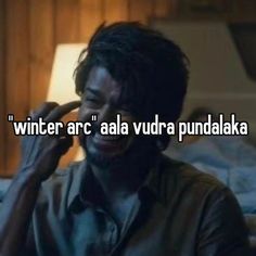 a man is laughing while talking on his cell phone with the caption'winter arc '