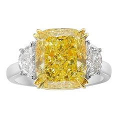 a yellow and white diamond ring