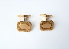 These 10k yellow gold antique cuff links were made by Ostby Barton - OB.  The gold cufflinks come with a velvet cufflink box.   There is a blank center oval, which can be monogramed by a jeweler if wanted. Around the oval has a typical art deco design.   You can zoom in the 2nd and 3rd photos to see the mark of OB and 10k on back of the cuff links.  If  you are looking for a piece of history and highly collectible jewelry, this cuff link set is for you. Engelhart Ostby of Ostby & Barton perished on the Titanic in 1912.  These 10k gold cufflinks measure approx. 5/8 inches long by approx. 1/2 inches at the tallest and weighs 5.6 grams. The vintage cuff links are in very good condition with minor scratching. Please see this section of my shop for more vintage fine jewelry: http://www.etsy.com Antique Screw Back Jewelry For Formal Occasions, Art Deco Formal Jewelry With Screw Back, Formal Art Deco Jewelry With Screw Back, Hallmarked Yellow Gold Cufflinks For Formal Occasions, Victorian Screw Back Jewelry For Formal Occasions, Victorian Formal Jewelry With Screw Back, Elegant Yellow Gold Cufflinks With Screw Back, Antique Yellow Gold Formal Cufflinks, Antique Yellow Gold Cufflinks For Formal Occasions