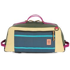 the large duffel bag is multicolored and has two zippers on each side