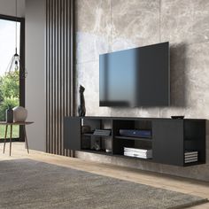 a living room with a large flat screen tv mounted to the side of a wall