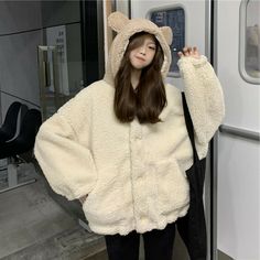 Product Description * Item:Womens Korean Fashion Cute Ears Hoodie Faux Fur Jacket Loose Casual Outwear Coat * Condition: 100% Brand New * Color:Beige * Size:Asian M-XL * Package:1pc Coats(without any accessories ）    Please note: 1.Please allow a little error due to manual measurement. 2.The color maybe a little difference because of the light,screen reflection etc. 3.If you are not sure what size to choose, you can tell us your height and weight, we will recommend the right size for you. Shippi 90s Chola Fashion, Outfit Bts, Korean Hoodie, Korean Fashion Cute, Casual Outwear, Cute Coats, Fleece Jacket Womens, Winter Stil, Japan Style