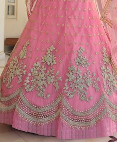 COLOR : Shimmering Blush Pink FABRIC : Top (Blouse) - Soft Net, Bottom (Lehenga) - Soft Net, Dupatta - Soft Net WORK : Heavy Metallic Thread Embroidery, Zari Work, Cutwork, Sequins, Motifs, Lace Border OCCASION : Wedding, Reception, Sangeet, Engagement READY-TO-WEAR : NoSTITCHING : Available as semi-stitched fabric, can be stitched using standard size option (+$30). Note: There might be a slight color variation due to lighting and flash used during photoshoot. The bright shade seen is the best c Blush Pink Fabric, Holiday Promotions, Cutwork Embroidery, Embroidered Wedding, Zari Work, Wedding Lehenga, Net Dupatta, Thread Embroidery, Lace Border