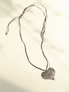 Embrace the spirit of love with our charming large love knot and long chain necklaces. These beautiful pieces combine the timeless elegance of a knot with the symbolic charm of a heart pendant, creating a beautiful accessory that celebrates the power of love.Main features:Our necklace comes in two charming styles, with a black knot and gold chain, and is decorated with a heart-shaped pendant on the gold and silver chain, symbolizing love. The pendant adds a touch of romance and charm to the necklace, creating a timeless and elegant true love.Embrace the power of love and express your love in style with our Big Love Knot and Long Chain Necklace - a heartfelt accessory that celebrates the beauty and power of love. Unique Hand Forged Necklace With Heart Pendant, Artisan Silver Heart Pendant Necklace, Unique Hand Forged Heart Pendant Jewelry, Unique Hand Forged Heart Pendant, Silver Heart Necklace, Hand Forged, Artisan Silver Necklace With Heart Charm, Silver Hand Forged Heart Necklace, Unique Sterling Silver Necklace With Heart Charm, Bohemian Sterling Silver Heart Necklace