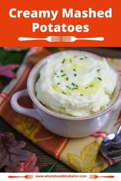 creamy mashed potatoes in a white bowl with a spoon on the side and text overlay