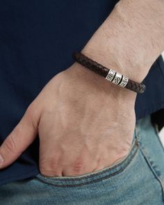 The perfect men's gift for a loved one! Made of premium leather and customizable silver beads, this handmade bracelet makes a unique and meaningful gift for a friend, spouse or family member. It also makes a great gift for birthdays, anniversaries, Christmas, Valentine's Day, Mother's Day, Father's Day and other special occasions. This personalized bracelet features a beautifully braided leather cord that is held in place by a sturdy magnet. ★ Important Notes: * Our this bracelet is an adjustabl Dad Bracelet, Bracelet For Him, Men's Leather Bracelet, Birthday Bracelet, Gift For Grandpa, Personalized Bracelet, Husband Birthday, Mens Leather Bracelet, Grandpa Gifts