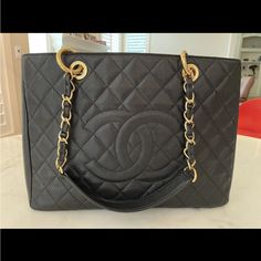 Chanel Handbag Authentic Vintage, Rarely Used. Large (13.5”Wx9.5”Hx4”D). 3 Compartments, One With Zipper. Comes With Original Certificate, Documentation, Cleaning Cloth (Unused), And Protective Storage Cover. Luxury Large Shoulder Bag With Top Carry Handle, Large Luxury Bags With Removable Pouch, Luxury Large Shoulder Bag With Removable Pouch, High-end Large Shoulder Bag For Everyday Use, Large Designer Shoulder Bag With Handle Drop, Luxury Large Bags With Detachable Handle, Luxury Large Bag With Detachable Handle, High-end Everyday Luxury Tote Shoulder Bag, Elegant Large Shoulder Bag With Top Carry Handle