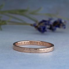 "A hammered rose gold ring, handmade from solid 14k will be custom made with your engraved personalized inscription and in your size. This ring is simple but awesome. The hammered surface makes this a lovely, minimalist, beautiful ring. The price includes an inscription inside of the ring of up to 14 letters. The second photo shows the ring next to a 14k yellow gold ring that is also available in my store. This listing is for the one rose gold ring only. If you prefer the ring in yellow gold, yo Hammered Rose Gold Stackable Rings For Wedding, Wedding Stackable Hammered Rose Gold Rings, Hammered Rose Gold Stackable Rings As Gift, Wedding Hammered Rose Gold Stackable Rings, Anniversary Rose Gold Hammered Stackable Rings, Resize Ring, One Rose, Personalized Ring, 14k Rose Gold Ring