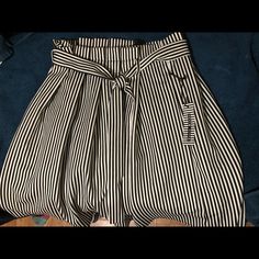 Black And White Striped Skirt/ Has Not Been Worn Chic Striped Knee-length Bottoms, Striped Pleated Skirt Bottoms For Summer, Striped Pleated Skirt For Summer, Chic Striped Lined Skirt Bottoms, Chic Striped Cotton Skirt, Striped Midi Skirt For Work, Casual Striped Skirt For Workwear, Casual Striped Skirt, Striped Relaxed Fit Midi Skirt