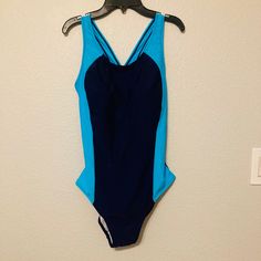 Questions? Leave A Comment Below! Stretch Blue Bodysuit For Swimming, Blue Sleeveless Bodysuit For Swimming, Blue Sleeveless One-piece Swimsuit, Blue One-piece Swimwear For Sports, Sports Blue One-piece Swimwear, Casual Blue One-piece Swimsuit For Pool, Blue Lined Bodysuit For Swimming, Casual Blue One-piece For Pool, Blue One-piece Swimwear For Workout