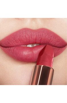 What it is: A rosebud-pink matte-finish lipstick with a long-lasting, buildable, hydrating formula.What it does: These dreamy, nuanced, rosebud shades help you look like the most beautiful version of you. The lipstick features 3D glow pigments that help lips appear wider and fuller, and its matte formula is enriched with Charlotte's secret ingredient and orchid extract to protect and soothe, delivering a cashmere-like finish. Its unique square-angled tip mimics the shape of a lip brush for preci Mi Kiss Charlotte Tilbury, Rosy Pink Lipstick, Rosy Lipstick, Peachy Lipstick, Charlotte Tilbury Looks, Perfect Lipstick Shade, Charlotte Tilbury Matte Revolution, The Look Of Love, Rose Makeup