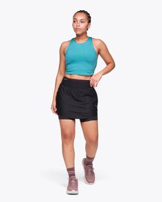 It has pockets. Nine pockets, to be exact. The Mizi Hike Skirt frees you up with stretchy-soft grid jersey for full range of motion, a built-in short liner and so much storage you might be tempted to ditch your pack. Why settle for less, when you can have both performance and style? | Features. Power mesh waistband pockets. Large front zip pockets. Soft, moisture-wicking liner short. Phone-friendly power mesh pockets in liner.. Stretch Nylon Skirt With Built-in Shorts, Functional Stretch Skort With Pockets, Sports Skirt With Stretch And Pockets, Functional Stretch Tennis Skirt With Pockets, Stretch Sports Skirt With Pockets, Stretch Skirt With Pockets For Sports, Functional Stretch Skort For Gym, Stretch Functional Skort For Gym, Functional Stretch Nylon Tennis Skirt