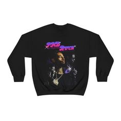 This is a custom design I created in tribute of PNB Rock.   * Made from 50% polyester and 50% cotton.   * Ribbed knit collar. so it retains its shape even after washing. * Medium-heavy fabric (8.0 oz/yd² (271.25 g/m * Sewn-in label.   * Runs true to size Hope it keeps you warm, enjoy. Edgy Cotton Sweater For Streetwear, Streetwear Sweater With Custom Print And Relaxed Fit, Custom Print Relaxed Fit Sweater For Streetwear, Relaxed Fit Sweater With Custom Print For Streetwear, 90s Graphic Print Sweater For Streetwear, Streetwear Crew Sweatshirt With Custom Print, Streetwear Sweatshirt With Sublimation Print In Relaxed Fit, Streetwear Custom Print Crew Top, Custom Print Long Sleeve Sweater For Streetwear