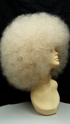 "A super jumbo size afro wig that packs plenty of volume and wow factor. Some styling may be required. Made with synthetic fibers. Color: Blonde (613) Circumference: Default at 21\" with adjustable cap (max 23\"). Materials: Synthetic Wig Fibers All sales are final. Please read all store policies before purchasing." Blonde Afro Wig, Blonde Afro, Afro Wig, Afro Wigs, Costume Wigs, Wow Factor, Synthetic Wig, Synthetic Wigs, Synthetic Fiber