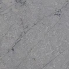 an image of marble that looks like it has been polished and is white with grey streaks