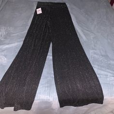 Form Fitting Long Pants Good For Work Or A Night Out. Never Worn. Long Pants, I Am 5’3” And The Pants Are Too Long For Me. Forever 21. Glamorous Black Glitter Pants, Winter Party Wide Leg Bottoms, Metallic Bottoms For Winter Night Out, Metallic Bottoms For Night Out In Winter, Black Glitter Bottoms For Evening, Glamorous Full-length Winter Bottoms, Black Glitter Bottoms, Glamorous Full Length Winter Bottoms, Glamorous Evening Winter Bottoms