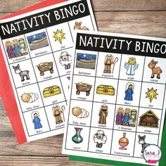 two nativity bingo game cards on a wooden table