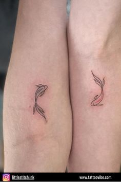 two fish tattoos on both legs