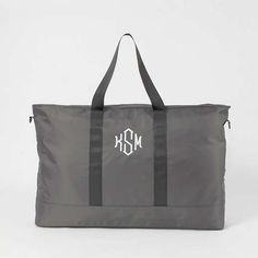 Get ready for road tripping with this monogrammed classic weekender! With its large size, this classic weekend bag is perfect for any adventure. Available in Charcoal and Rose, this bag features a removable adorable strap long enough to easily throw over your shoulder and a zipper pocket on the inside to store all your travel items. It includes a zippered top to ensure all of your belongings stay safe and secure inside. Make sure to check out more of our classic collection here! ​Measures Gray Rectangular Duffle Bag For Travel, Gray Travel Bag With Zipper Closure, Gray Travel Tote Bag, Gray Tote Travel Bag, Rectangular Monogram Travel Bag, Marley Lilly, Throw Over, Weekend Bag, Travel Items