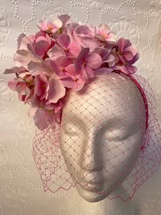 Introducing the 'Sylvie'.. a beautiful combination of pink blooms on a lolly pink satin headband with pink veiling. Perfect for any wedding guest outfit or race wear.#fashionsonthefield #melbournecup #springracingfashion #floralfascinator #floralheadpiece #springracingcarnival #autumnracingcarnival #floral NB: Penelope P Designs are one off and unique pieces. They are not replicated Luxury Romantic Pink Headpieces, Floral Head Piece, Elegant Spring Party Veil, Elegant Pink Hair Accessories For Royal Ascot, Pink Handmade Flower Hair Accessories For Party, Pink Headband Fascinator For Races, Pink Headband Fascinator For Evening, Pink Flower Headpiece For Wedding, Pink Evening Fascinator Headband