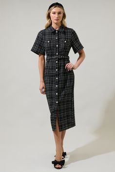 If there's one thing, we love to see in our close it is the Brook Tweed Button Down Midi Dress! A collared neckline and short sleeves frame this button-down dress made of soft tweed fabric. A belt around the waist hugs around. Wear it with any black heels to match this dress. - Tweed- Belted- Button down- Pockets- Color: BlackSize + Fit - Model is 5'8" and wearing size XS- Measurements taken from size S - Chest: 17"- Length: 48 1/4" Fabric Self:100%Polyester, Lining:97%Polyester 3%Spandex Style Tweed Dress With Button Closure For Work, Black Tweed Office Dress, Office Tweed Dress With Button Closure, Tweed Workwear Dress With Buttons, Short Sleeve Tweed Dress For Office, Formal Short Sleeve Tweed Dress, Tweed Midi Dress For Office, Knee-length Buttoned Tweed Dress For Office, Office Tweed Midi Dress