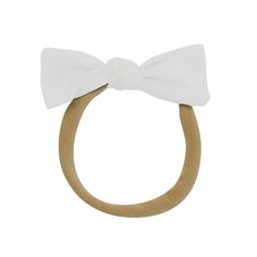 Add a touch of sweetness to your little one’s look with this easy-to-wear, knotted bow that keeps them feeling comfortable and looking cute. A soft, stretchy band made from nylon is super gentle on baby-fine hair and stays in place, no matter how much your little one crawls, rolls, or runs throughout the day. Nylon band 2.5” knotted bow Womens Matching Sets, Bag Hanger, Toddler Blanket, Sock Shop, Bamboo Fabric, Pet Bandana, Family Outfits, Burp Cloths, Baby Bag