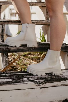 This Chelsea boot is all the rage this season! This chunky flat boot is not only stylish but practical too! The faux leather allows for durability, the thick treaded bottom will allow traction, and the elastic sides allow you to easily pull on and off this boot. Pair with your favorite fall outfit for a perfect stand out look. Fits true to size. Man made materials. Baby Necklace, Fall For You, White Boots, Boots Fall, Flat Boots, Chelsea Boot, Modest Dresses, Fall Outfit, The Basics